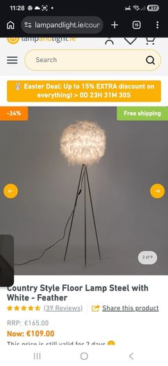 Silver lamp stand with feather shade