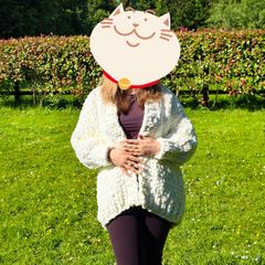 Knitted women cardigan puffy