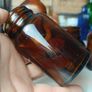 471 - Set of 4 Vintage Amber Glass Screw Top Collectible Decorative Bottles Image 2