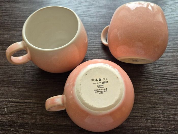 three round pink cups