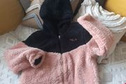 pink and black fluffy jacket from fila