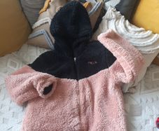 pink and black fluffy jacket from fila