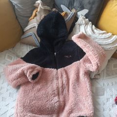 pink and black fluffy jacket from fila