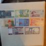 Lot of 8 World Banknotes.Uncirculated.No 9.Crisp,clean,bright. Image 2