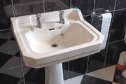 Sink with pedestal