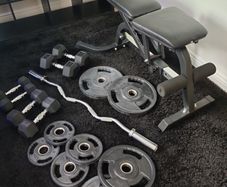 Full set gym at home. Bench press Z-bar plates