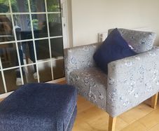 Armchair and foot stool