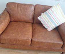 tan leather 2 seater couch