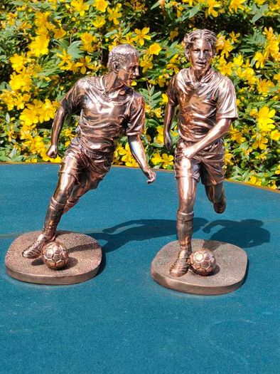 Two Gilded footballers