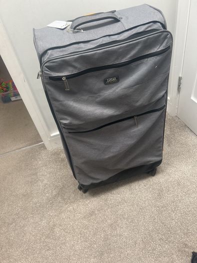 Free big grey suitcase