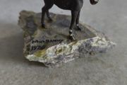 Small horse on chipped  green marble plinth from Co Mayo MULRANNY 1970 .