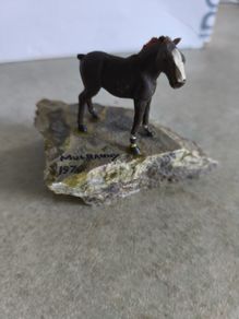 Small horse on chipped  green marble plinth from Co Mayo MULRANNY 1970 .
