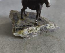 Small horse on chipped  green marble plinth from Co Mayo MULRANNY 1970 .