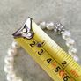 Boxed Jon Richard faux pearl stretch bracelet with a central crystal bead Image 2