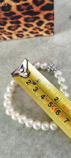 Boxed Jon Richard faux pearl stretch bracelet with a central crystal bead