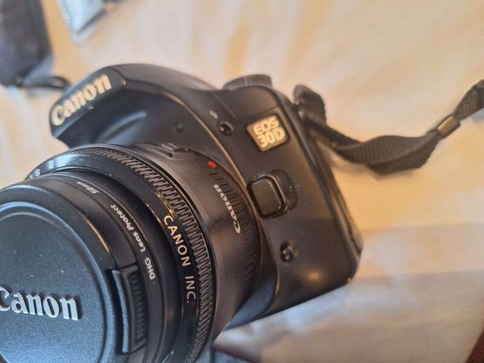 canon camera and pro lenses and a Pentax film system