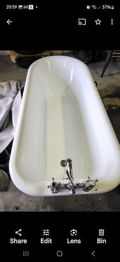 Cast iron bath, sink, toilet and pull chain cister