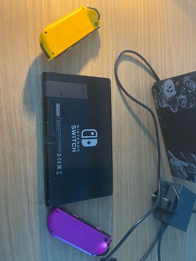 Nintendo Switch Console with Dock and Charger. Fully working, Purple and Orange joycons