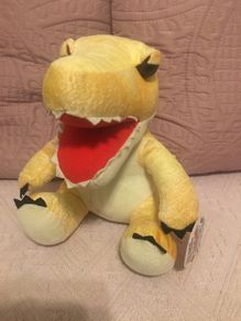 Plush dinosaur/ baby crocodile soft toy.