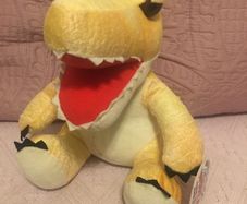 Plush dinosaur/ baby crocodile soft toy.