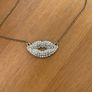Gold tone sparkling lips necklace Image 2