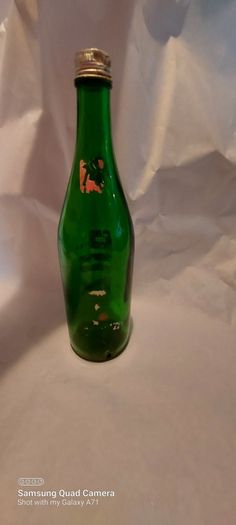 7up bottle with cap,used condition,nice advertising, price includes post to anywhere in Ireland thank you,see pictures,