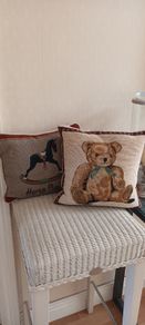 Pair of Nursery Cushions.