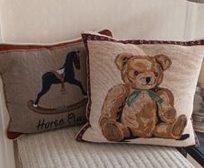 Pair of Nursery Cushions.