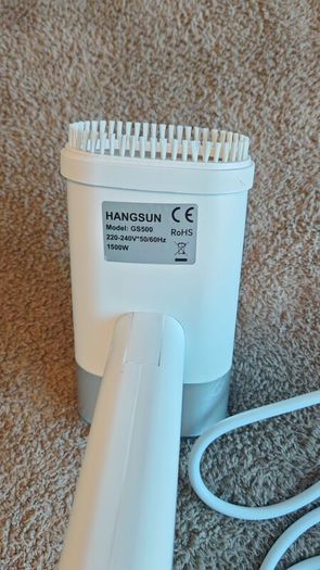Handheld garment steamer
