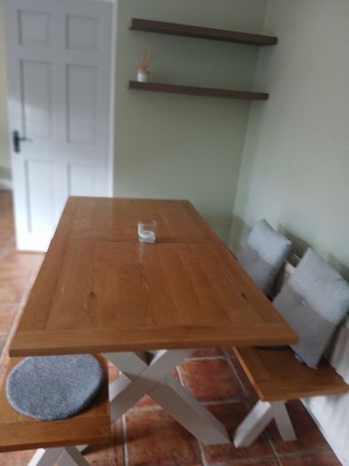 Oak dining table with bench - water damage on surface