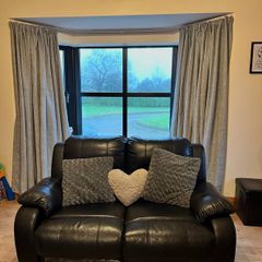 Black leather recliner suite