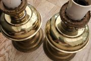 a lovely pair of old brass lamps