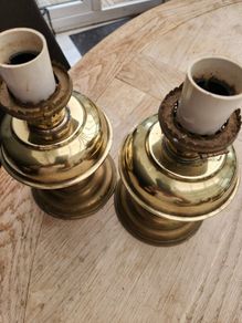 a lovely pair of old brass lamps