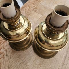 a lovely pair of old brass lamps