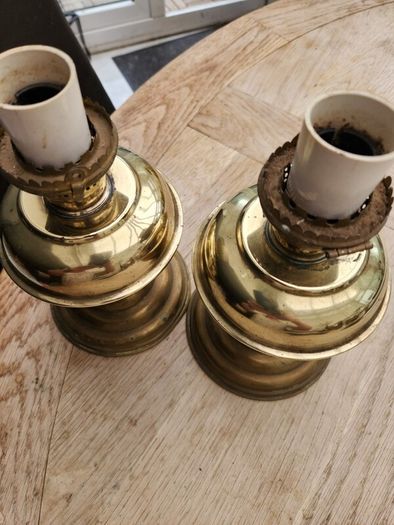 a lovely pair of old brass lamps