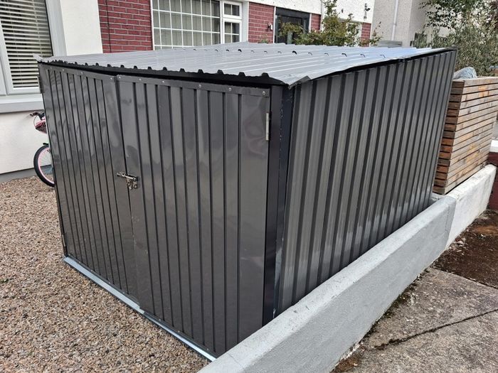 Metal Shed, 1 year old. Damaged by wind, for repair or scrap only