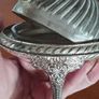 A vintage silver-plated butter dish or caviar bowl with a three-legged lid. Image 3
