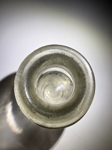 Old clear small glass jar