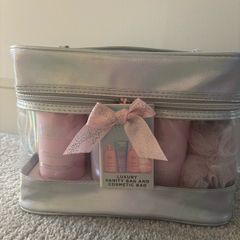 Brand new and unopened Baylis & Harding luxury gift set in a stylish vanity/cosmetic bag.