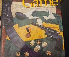 In The Name Of The Game. By J.j. Barrett. First Edition Paperback In Good Condition.  See Photos For Same.