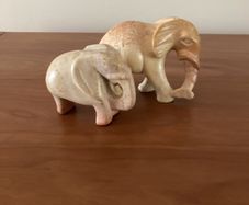 Mike her and baby elephant soap stone statues