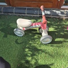 pink tricycle