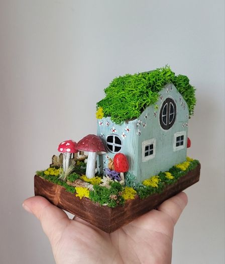 handcrafted fairy cottage with moss roof!