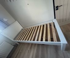 Wooden single bed