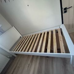 Wooden single bed