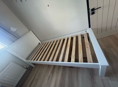 Wooden single bed