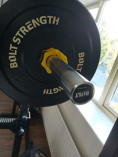155kg Bumper Plate Set 7ft Olympic Bar and adjustable Squat Stands.