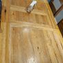 Solid wood oak extending dining table with matching chairs Image 3