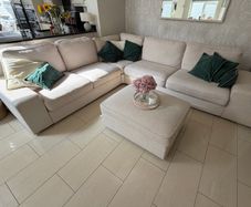 Large corner sofa with large storage footstool