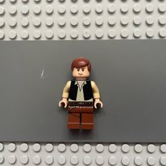 lego Star Wars sw0179 Han Solo minifigure- Black Vest over Tan Shirt, Reddish Brown Legs with Belts, Eyes with Glints